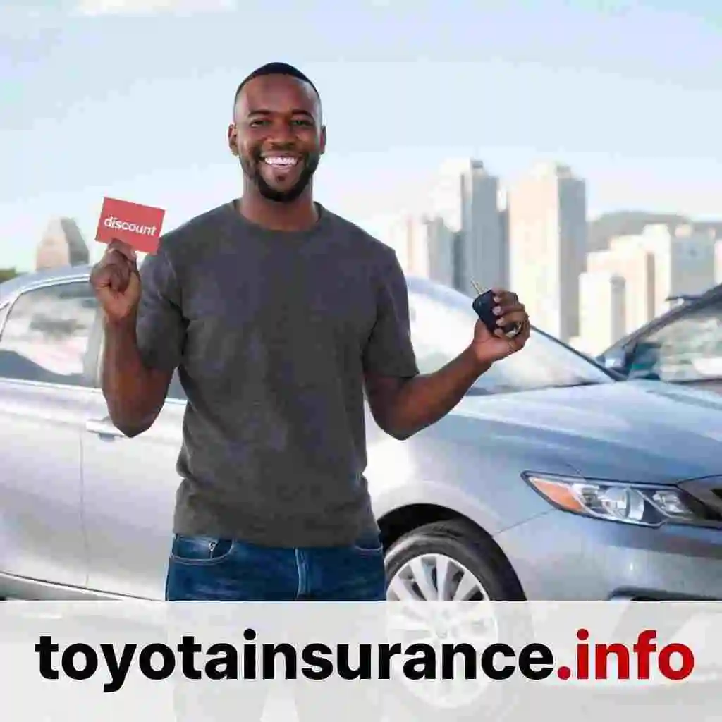 Toyota Camry owner celebrating car insurance discounts in the city